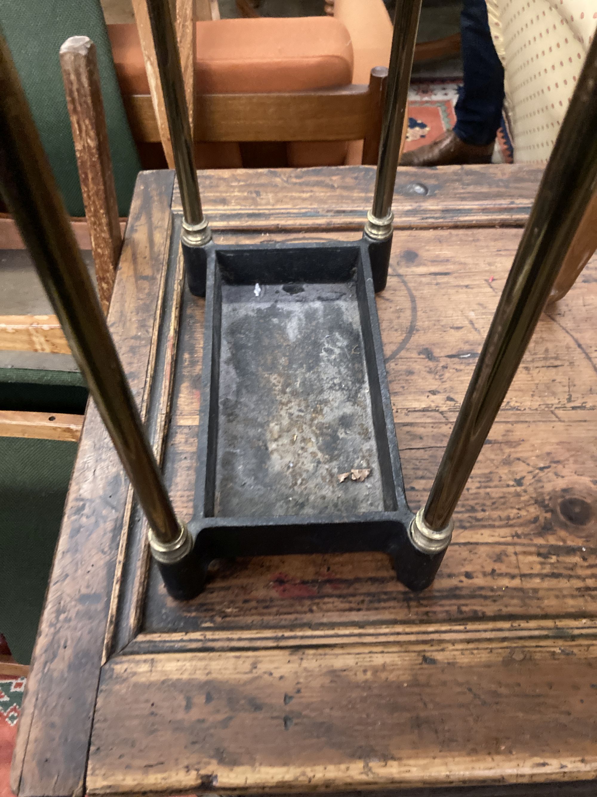 A Victorian brass and cast iron six division stick stand, width 32cm depth 19cm height 62cm